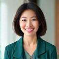 Portrait of Dr. Evelyn Lee, a kind and professional naturopathic doctor, smiling gently.
